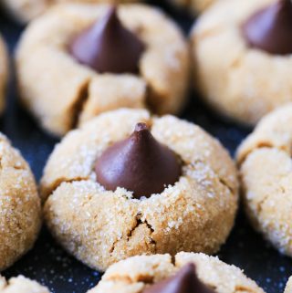 Rows of peanut butter blossom cookies.
